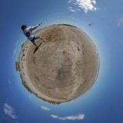 Kane flying the kite on planet sand